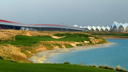 ABU DHABI, UNITED ARAB EMIRATES - JANUARY 26:  A view from the tee on the par 3, 8th hole looking towards the clubhouse and the Yas Island Formula 1 racetrack at Yas Island Golf Club designed by Kyle Phillips of the USA nearing completion on January 26, 2010 in Abu Dhabi, United Arab Emirates.  (Photo by David Cannon/Getty Images)