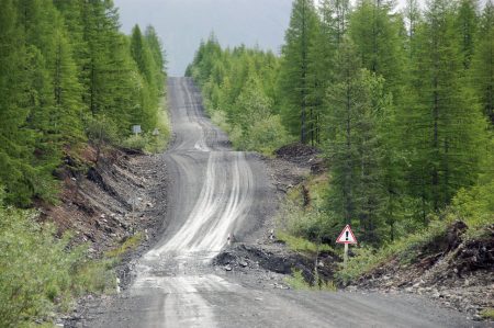 Gravel road at Kolyma state highway Russia outback