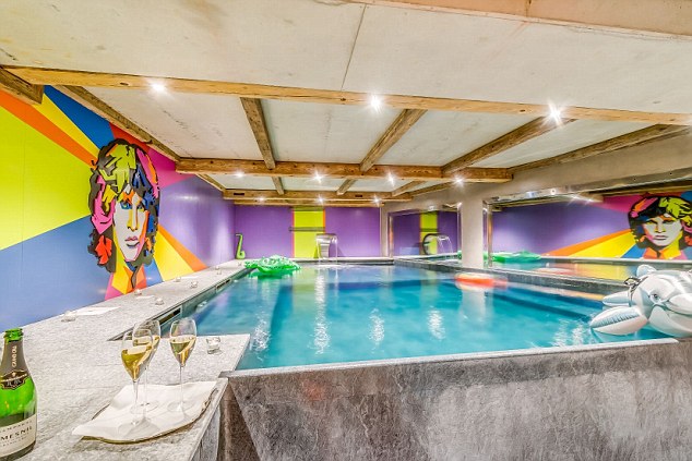 Chalet Rock N Love Tignes Les Brevieres, France Credit Andy Parent Image via MOS reporter Nick Pryer It's strictly rock 'n' roll so you gotta like it before you book it. Possibly the most bonkers chalet on the market the eccentric owner has woven iconic rock lyrics into some of the bedroom carpets (sleeps 8 adults and up to 6 children) including the intro to Led Zeppelin's Stairway to Heaven. The walls of the indoor pool are emblazoned with Jim Morrison, Kiss are in the lounge and Bob Dylan in the gym which boasts a collagen boosting, light therapy hydro-jet bed, boxing bag, steam and massage rooms, kettle weights, rowing machine, music and aromatherapy. There's a balcony hot tub too but the games room might be more fun with pool table converted from real Mini Cooper, Wurlitzer juke box with 100 rock albums, range of musical instruments to play, a Marshall amplifier and a fully stocked bar. Perhaps best of all is the garage room over which children have to fight adults for the beds converted from real VW T2 touring vans and a CJ jeep. Oh and of course there is human size Transformer in the kitchen. Low £10,000 - High £30,500
