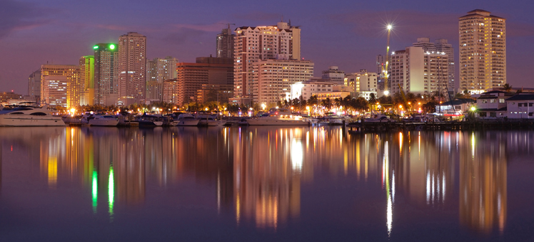 vibrant manila bay city night-scape and buildings reflection.; Shutterstock ID 100414315; PO: CLP Image Gallery Test; Client: Hotels.com; Other: (79)